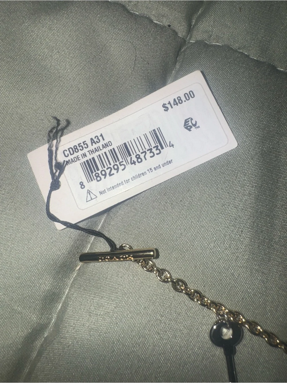Coach Gold tone Charm Bracelet with Padlock, Key and Pearl Accents CD855 A31